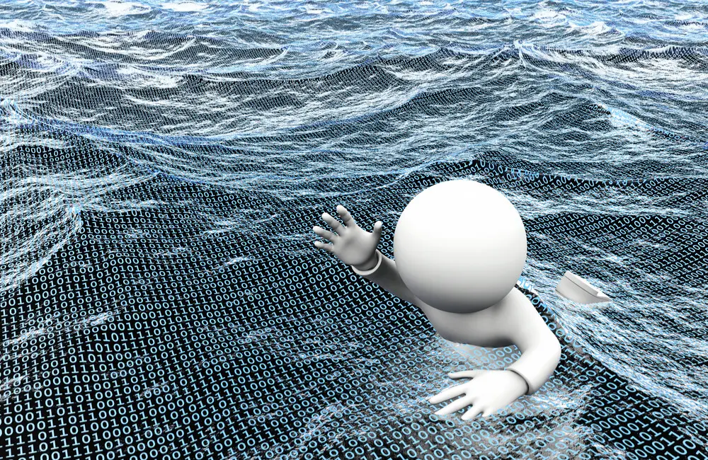 A graphic of one individual swimming in a sea of code.